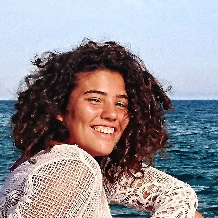 Portrait of Mira, group coordinator and fusion cooking expert